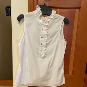 Tory Burch white ruffle top with silver logo buttons, size 8.